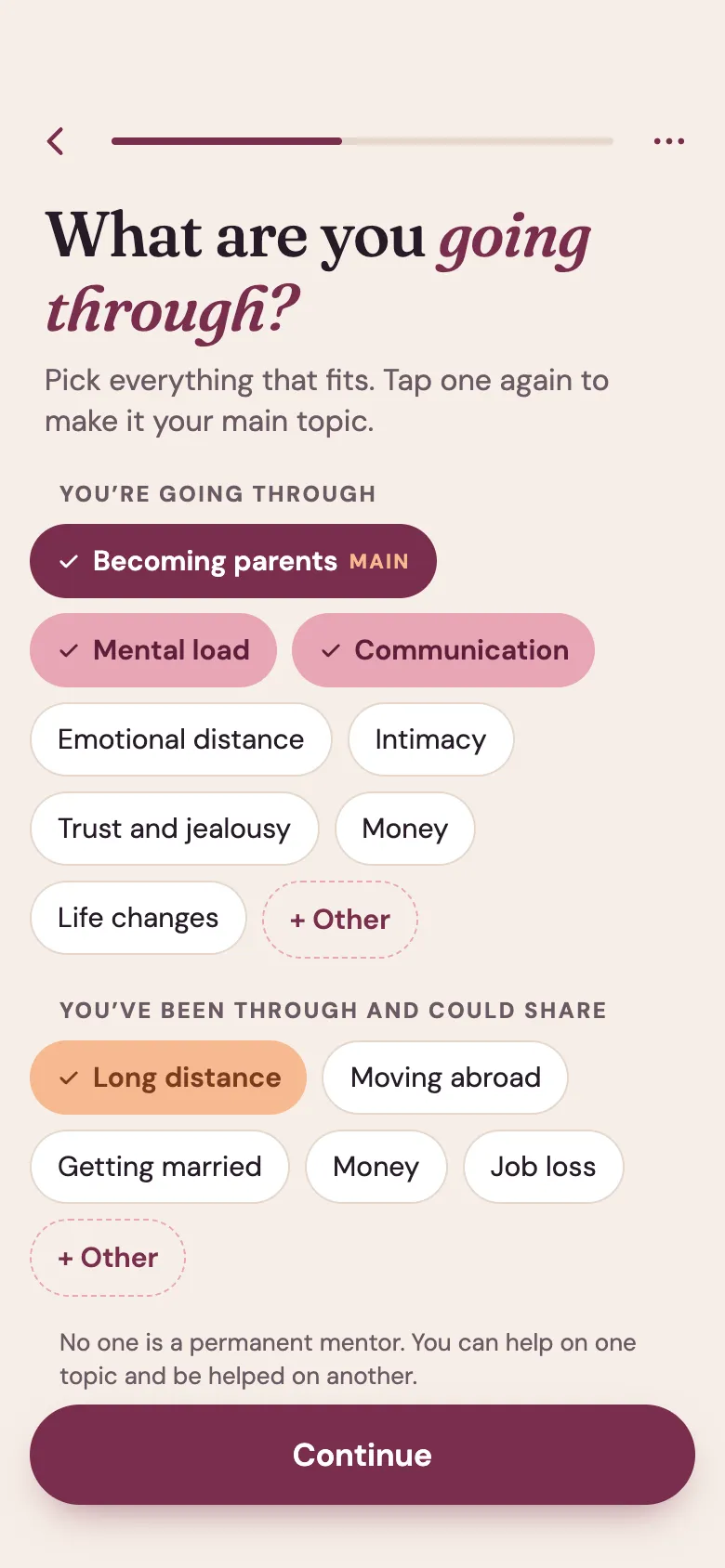 Venna app screen: “What are you going through?” The topics picked include becoming parents, mental load and communication.